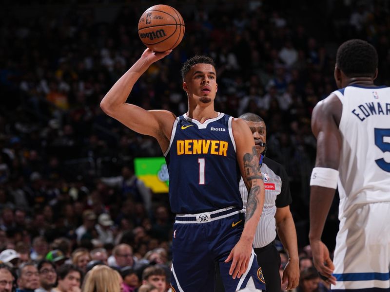 DENVER, CO - APRIL 10: Michael Porter Jr. #1 of the Denver Nuggets handles the ball against Anthony Edwards #5 of the Minnesota Timberwolves during the game on April 10, 2024 at the Ball Arena in Denver, Colorado. NOTE TO USER: User expressly acknowledges and agrees that, by downloading and/or using this Photograph, user is consenting to the terms and conditions of the Getty Images License Agreement. Mandatory Copyright Notice: Copyright 2024 NBAE (Photo by Bart Young/NBAE via Getty Images)