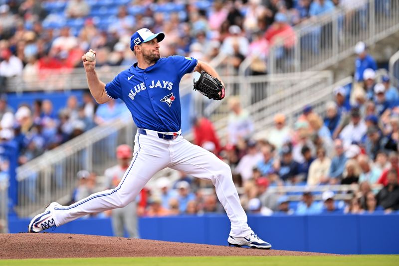 Feb 25, 2025; Dunedin, Florida, USA; Toronto Blue Jays starting pitcher Max Scherzer (31) throws against the St. Louis Cardinals in the first inning of a spring training game at TD Ballpark. Mandatory Credit: Jonathan Dyer-Imagn Images