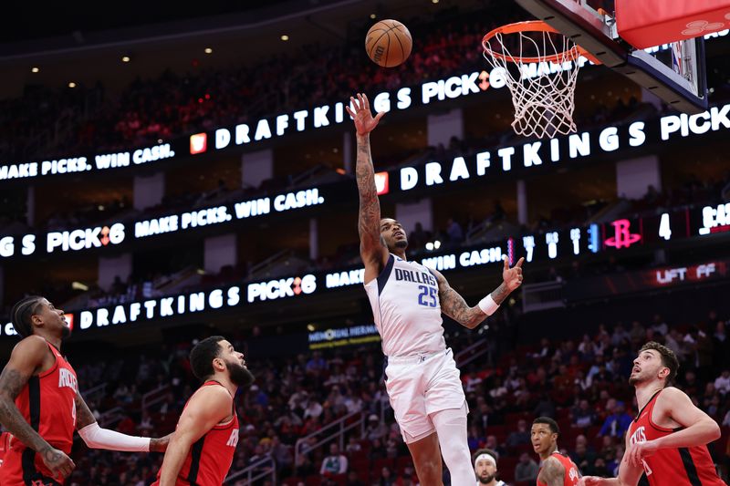 HOUSTON, TEXAS - JANUARY 01: P.J. Washington #25 of the Dallas Mavericks shoots against the Houston Rockets during the first half at Toyota Center on January 01, 2025 in Houston, Texas. NOTE TO USER: User expressly acknowledges and agrees that, by downloading and or using this photograph, User is consenting to the terms and conditions of the Getty Images License Agreement. (Photo by Alex Slitz/Getty Images)