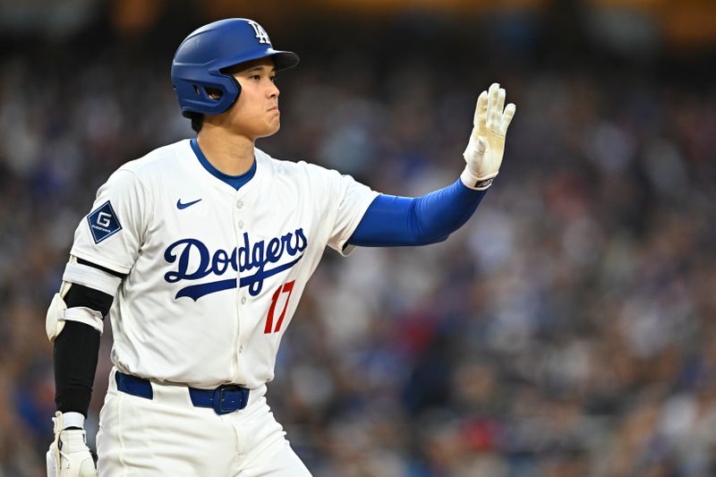 May 17, 2025; Los Angeles, California, USA; Los Angeles Dodgers designated hitter Shohei Ohtani (17) reacts against the Los Angeles Angels during the fourth inning at Dodger Stadium. Mandatory Credit: Jonathan Hui-Imagn Images