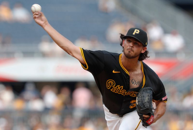 Jul 3, 2024; Pittsburgh, Pennsylvania, USA;  Pittsburgh Pirates starting pitcher Jared Jones (37) delivers a pitch against the St. Louis Cardinals during the second inning at PNC Park. Mandatory Credit: Charles LeClaire-USA TODAY Sports