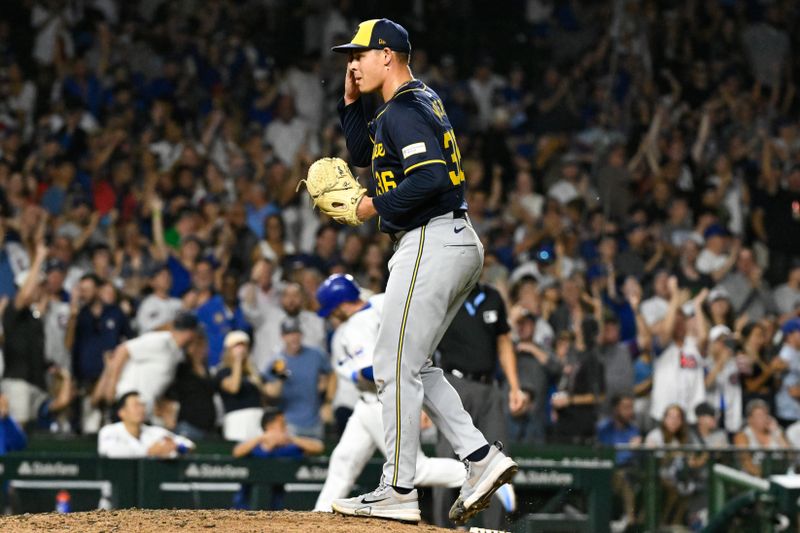 Jul 22, 2024; Chicago, Illinois, USA;  Milwaukee Brewers pitcher Tobias Myers (36) wipes his face after Chicago Cubs outfielder Ian Happ (8) hits a home run during the sixth inning at Wrigley Field. Mandatory Credit: Matt Marton-USA TODAY Sports