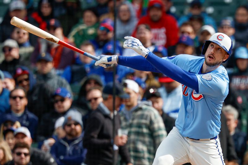 Apr 25, 2025; Chicago, Illinois, USA; Chicago Cubs right fielder Kyle Tucker (30) singles against the Philadelphia Phillies during the first inning at Wrigley Field. Mandatory Credit: Kamil Krzaczynski-Imagn Images