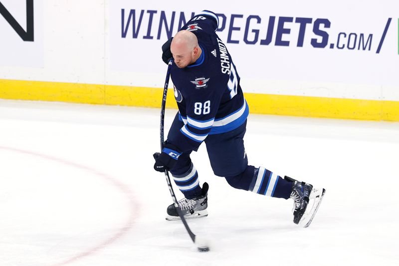 Oct 30, 2023; Winnipeg, Manitoba, CAN; Winnipeg Jets defenseman Nate Schmidt (88) warms up before a game against the New York Rangers at Canada Life Centre. Mandatory Credit: James Carey Lauder-USA TODAY Sports