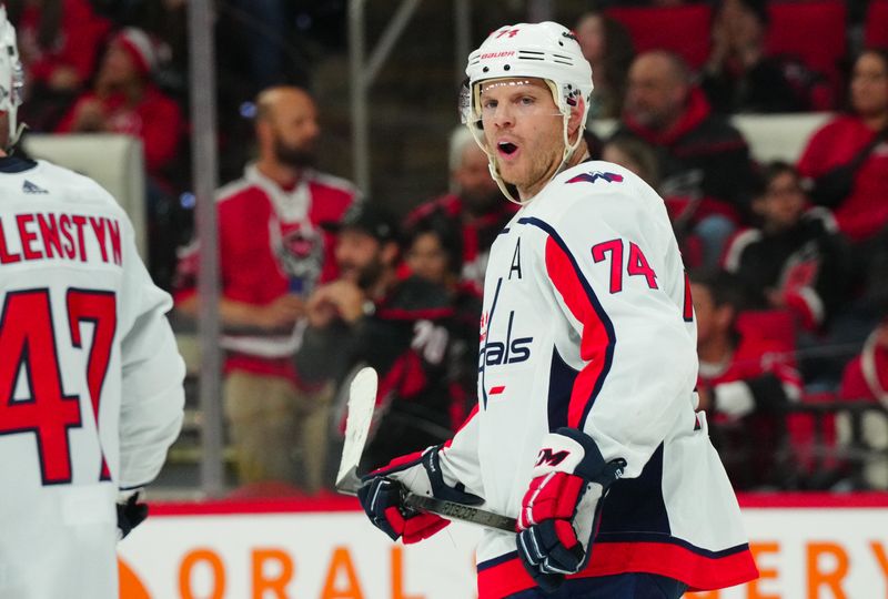 Apr 5, 2024; Raleigh, North Carolina, USA; Washington Capitals defenseman John Carlson (74) reacts to a penalty call against the Carolina Hurricanes during the third period at PNC Arena. Mandatory Credit: James Guillory-USA TODAY Sports