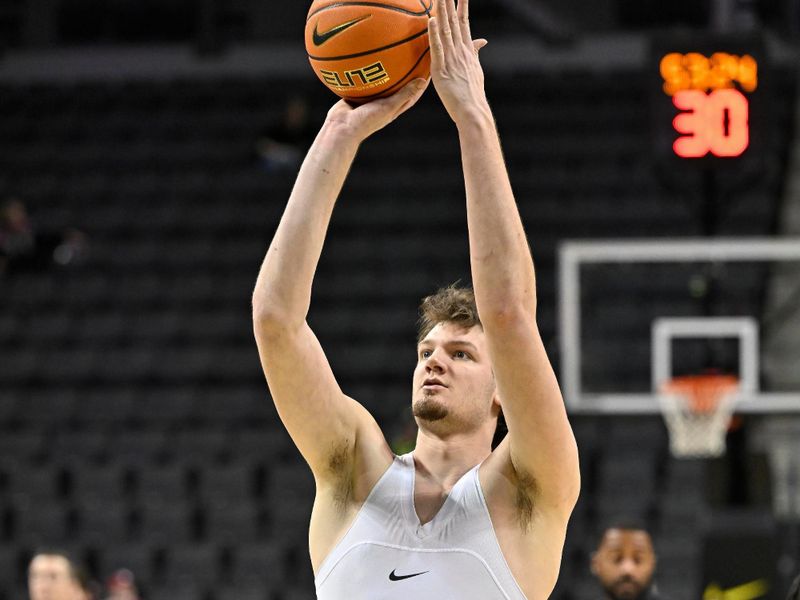 Mar 4, 2025; Eugene, Oregon, USA; Oregon Ducks center Nate Bittle (32) warms up before the game against the Oregon Ducks at Matthew Knight Arena. Mandatory Credit: Craig Strobeck-Imagn Images