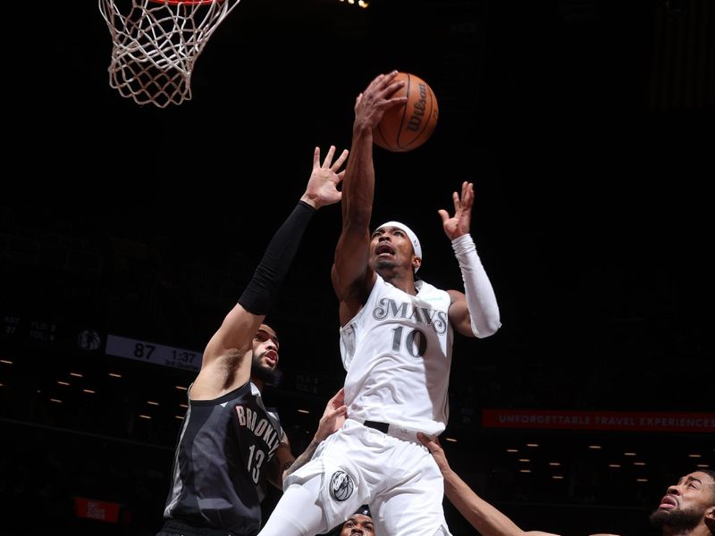 BROOKLYN, NY - MARCH 24: Brandon Williams #10 of the Dallas Mavericks drives to the basket during the game against the Brooklyn Nets on March 24, 2025 at Barclays Center in Brooklyn, New York. NOTE TO USER: User expressly acknowledges and agrees that, by downloading and or using this Photograph, user is consenting to the terms and conditions of the Getty Images License Agreement. Mandatory Copyright Notice: Copyright 2025 NBAE (Photo by Nathaniel S. Butler/NBAE via Getty Images)