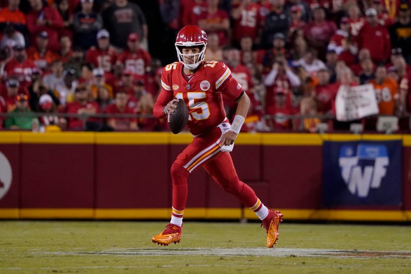 Kansas City Chiefs quarterback Patrick Mahomes looks to pass during an NFL football game against the Denver Broncos Thursday, Oct. 12, 2023 in Kansas City, Mo. (AP Photo/Ed Zurga)