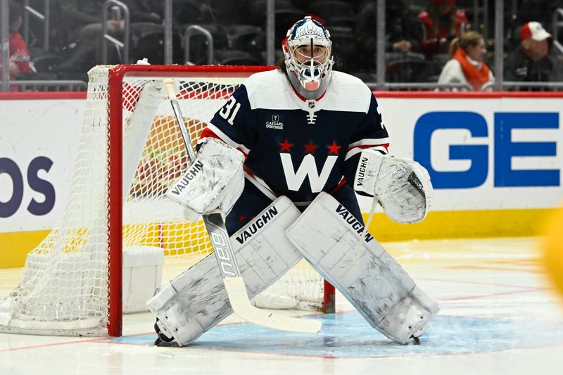 Dec 30, 2023; Washington, District of Columbia, USA; Washington Capitals goalie Hunter Shepard (31) in net against the Nashville Predators during the second period at Capital One Arena. Mandatory Credit: Brad Mills-USA TODAY Sports