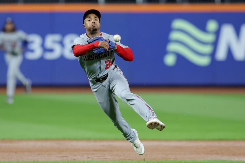 Sep 16, 2024; New York City, New York, USA; Washington Nationals shortstop Nasim Nunez (26) throws out New York Mets designated hitter J.D. Martinez (not pictured) on a ground ball during the first inning at Citi Field. Mandatory Credit: Brad Penner-Imagn Images