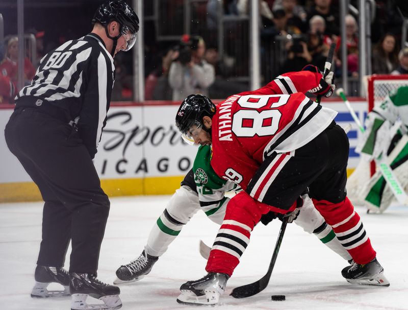 Apr 6, 2024; Chicago, Illinois, USA; Chicago Blackhawks center Andreas Athanasiou (89) attempts to get the puck against the Dallas Stars during the first period at United Center. Mandatory Credit: Seeger Gray-USA TODAY Sports