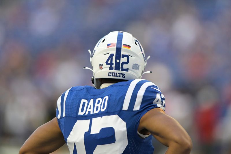 The United States and German flag logos are on the helmet Indianapolis Colts cornerback Marcel Dabo (42) before an NFL preseason preseason football game against the Tampa Bay Buccaneers in Indianapolis, Saturday, Aug. 27, 2022. (AP Photo/Doug McSchooler)