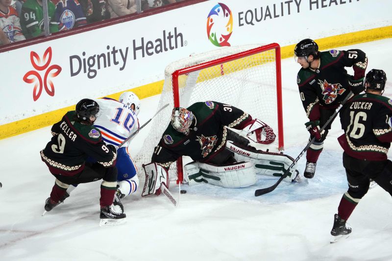 Feb 19, 2024; Tempe, Arizona, USA; Arizona Coyotes goalie Matt Villata (31) makes a save against Edmonton Oilers center Derek Ryan (10) during the first period at Mullett Arena. Mandatory Credit: Joe Camporeale-USA TODAY Sports