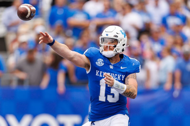 Sep 9, 2023; Lexington, Kentucky, USA; Kentucky Wildcats quarterback Devin Leary (13) throws a pass during the second quarter against the Eastern Kentucky Colonels at Kroger Field. Mandatory Credit: Jordan Prather-USA TODAY Sports