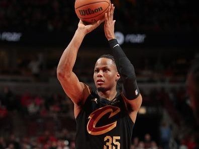 MILWAUKEE, WI - DECEMBER 23: Isaac Okoro #35 of the Cleveland Cavaliers shoots a free throw during the game against the Chicago Bulls on December 23, 2023 at the Fiserv Forum Center in Milwaukee, Wisconsin. NOTE TO USER: User expressly acknowledges and agrees that, by downloading and or using this Photograph, user is consenting to the terms and conditions of the Getty Images License Agreement. Mandatory Copyright Notice: Copyright 2023 NBAE (Photo by Gary Dineen/NBAE via Getty Images).