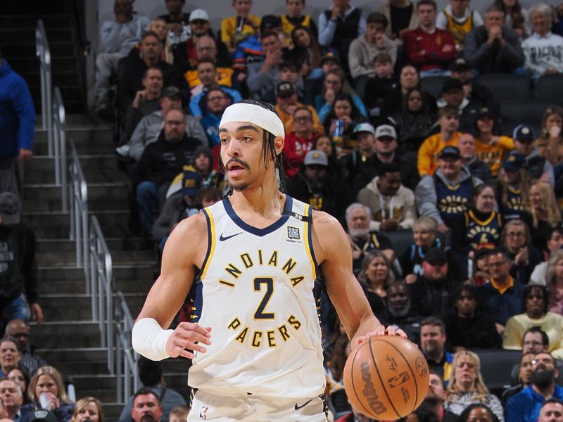 INDIANAPOLIS, IN - MARCH 18:  Andrew Nembhard #2 of the Indiana Pacers handles the ball during the game  on March 18, 2024 at Gainbridge Fieldhouse in Indianapolis, Indiana. NOTE TO USER: User expressly acknowledges and agrees that, by downloading and or using this Photograph, user is consenting to the terms and conditions of the Getty Images License Agreement. Mandatory Copyright Notice: Copyright 2024 NBAE (Photo by Ron Hoskins/NBAE via Getty Images)