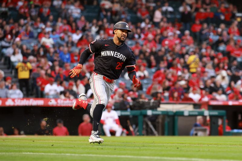 Apr 26, 2024; Anaheim, California, USA;  Minnesota Twins outfielder Byron Buxton (25) runs on an RBI double during the third inning against the Los Angeles Angels at Angel Stadium. Mandatory Credit: Kiyoshi Mio-USA TODAY Sports