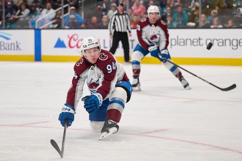 Oct 20, 2024; San Jose, California, USA; Colorado Avalanche left wing Joel Kiviranta (94) kneels to block a shot against the San Jose Sharks during the second period at SAP Center at San Jose. Mandatory Credit: Robert Edwards-Imagn Images