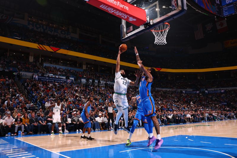 OKLAHOMA CITY, OK - JANUARY 29: Karl-Anthony Towns #32 of the Minnesota Timberwolves drives to the basket during the game against the Oklahoma City Thunder on January 29, 2024 at Paycom Arena in Oklahoma City, Oklahoma. NOTE TO USER: User expressly acknowledges and agrees that, by downloading and or using this photograph, User is consenting to the terms and conditions of the Getty Images License Agreement. Mandatory Copyright Notice: Copyright 2024 NBAE (Photo by Zach Beeker/NBAE via Getty Images)