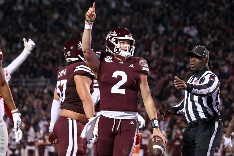 Nov 23, 2023; Starkville, Mississippi, USA; Mississippi State Bulldogs quarterback Will Rogers (2) reacts during the second half against the Mississippi Rebels at Davis Wade Stadium at Scott Field. Mandatory Credit: Petre Thomas-USA TODAY Sports