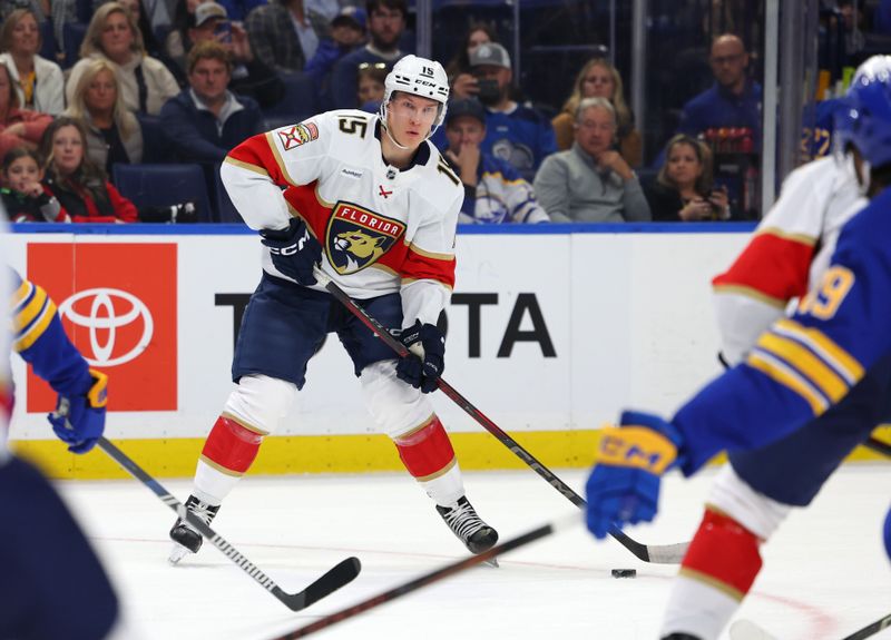 Oct 28, 2024; Buffalo, New York, USA;  Florida Panthers center Anton Lundell (15) looks to make a pass during the first period against the Buffalo Sabres at KeyBank Center. Mandatory Credit: Timothy T. Ludwig-Imagn Images