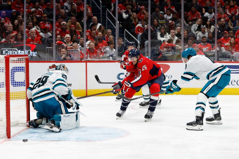 Dec 3, 2024; Washington, District of Columbia, USA; San Jose Sharks goaltender Mackenzie Blackwood (29) makes a save on Washington Capitals center Nic Dowd (26) in the third period at Capital One Arena. Mandatory Credit: Geoff Burke-Imagn Images