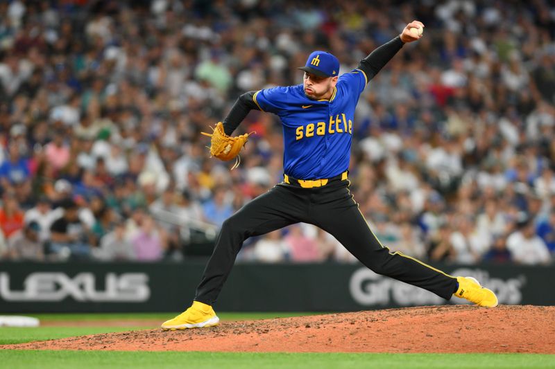 Jul 19, 2024; Seattle, Washington, USA; Seattle Mariners relief pitcher Tayler Saucedo (60) pitches to the Houston Astros during the eighth inning at T-Mobile Park. Mandatory Credit: Steven Bisig-USA TODAY Sports