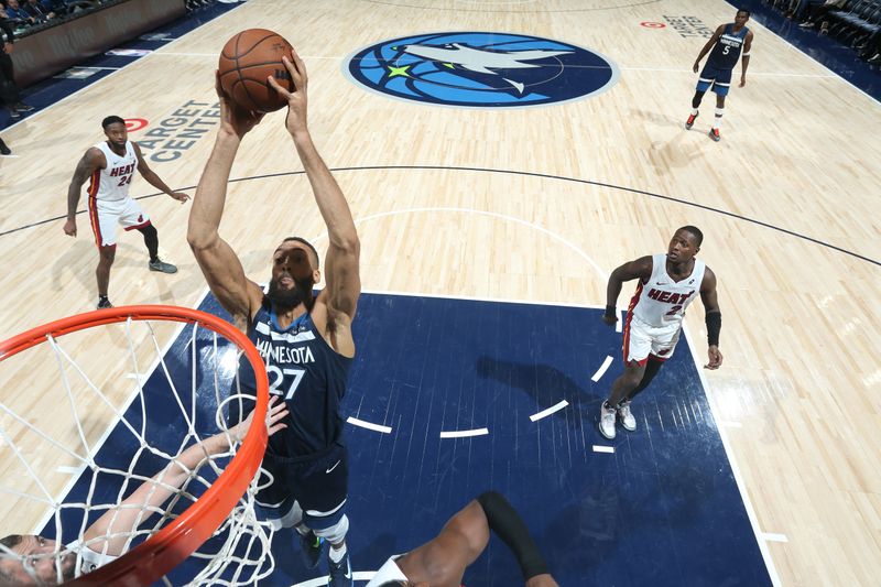 MINNEAPOLIS, MN -  NOVEMBER 10: Rudy Gobert #27 of the Minnesota Timberwolves dunks the ball during the game against the Miami Heat on November 10, 2024 at Target Center in Minneapolis, Minnesota. NOTE TO USER: User expressly acknowledges and agrees that, by downloading and or using this Photograph, user is consenting to the terms and conditions of the Getty Images License Agreement. Mandatory Copyright Notice: Copyright 2024 NBAE (Photo by David Sherman/NBAE via Getty Images)