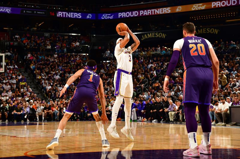 PHOENIX, AZ - FEBRUARY 25: Anthony Davis #3 of the Los Angeles Lakers shoots the ball during the game against the Phoenix Suns on February 25, 2024 at Footprint Center in Phoenix, Arizona. NOTE TO USER: User expressly acknowledges and agrees that, by downloading and or using this photograph, user is consenting to the terms and conditions of the Getty Images License Agreement. Mandatory Copyright Notice: Copyright 2024 NBAE (Photo by Kate Frese/NBAE via Getty Images)