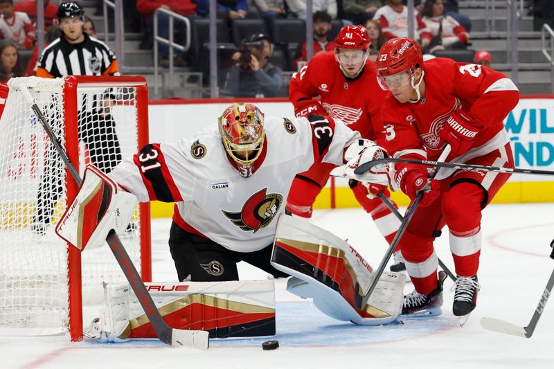 Oct 4, 2024; Detroit, Michigan, USA;  Ottawa Senators goaltender Anton Forsberg (31) makes a save on Detroit Red Wings left wing Lucas Raymond (23) in the second period at Little Caesars Arena. Mandatory Credit: Rick Osentoski-Imagn Images