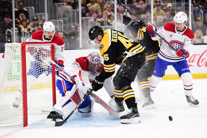 Oct 10, 2024; Boston, Massachusetts, USA; Boston Bruins left wing Cole Koepke (45) looks for the puck in front of Montreal Canadiens goaltender Cayden Primeau (30) during the first period at TD Garden. Mandatory Credit: Bob DeChiara-Imagn Images