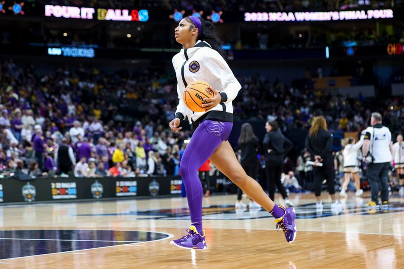 Apr 2, 2023; Dallas, TX, USA; LSU Lady Tigers forward Angel Reese (10) dribbles the ball during warmups prior to the game against the Iowa Hawkeyes in the final round of the Women's Final Four NCAA tournament at the American Airlines Center. Mandatory Credit: Kevin Jairaj-USA TODAY Sports