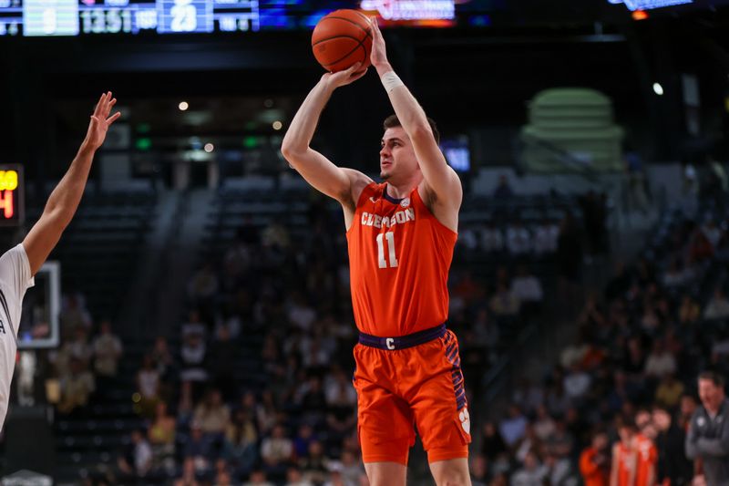 Feb 21, 2024; Atlanta, Georgia, USA; Clemson Tigers guard Joseph Girard III (11) shoots against the Georgia Tech Yellow Jackets in the first half at McCamish Pavilion. Mandatory Credit: Brett Davis-USA TODAY Sports
