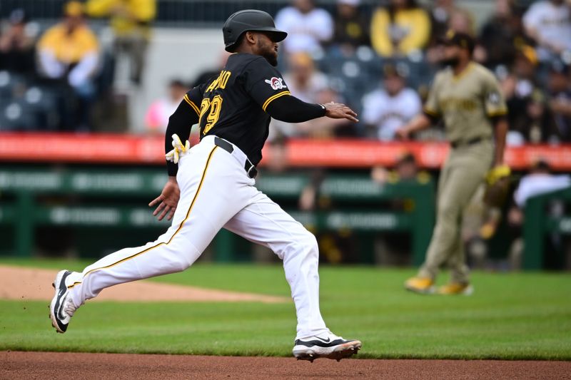 May 3, 2025; Pittsburgh, Pennsylvania, USA; Pittsburgh Pirates left fielder Alexander Canario (29) runs home to score a run on an RBI single by center fielder Oneil Cruz (15) during the second inning against the San Diego Padres at PNC Park. Mandatory Credit: David Dermer-Imagn Images