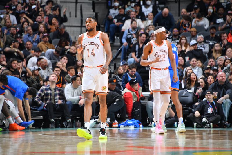 SAN ANTONIO, TX - JANUARY 24: Blake Wesley #14 and Malaki Branham #22 of the San Antonio Spurs celebrate during the game against the Oklahoma City Thunder on January 24, 2024 at the Frost Bank Center in San Antonio, Texas. NOTE TO USER: User expressly acknowledges and agrees that, by downloading and or using this photograph, user is consenting to the terms and conditions of the Getty Images License Agreement. Mandatory Copyright Notice: Copyright 2024 NBAE (Photos by Michael Gonzales/NBAE via Getty Images)