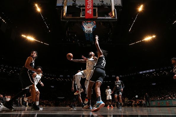 BROOKLYN, NY - DECEMBER 27: Damian Lillard #0 of the Milwaukee Bucks drives to the basket during the game against the Brooklyn Nets on December 27, 2023 at Barclays Center in Brooklyn, New York. NOTE TO USER: User expressly acknowledges and agrees that, by downloading and or using this Photograph, user is consenting to the terms and conditions of the Getty Images License Agreement. Mandatory Copyright Notice: Copyright 2023 NBAE (Photo by Nathaniel S. Butler/NBAE via Getty Images)