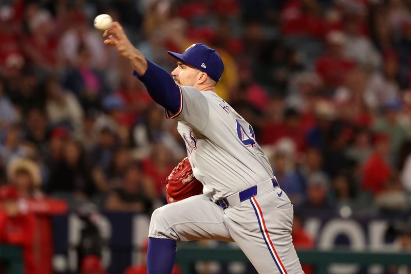 Sep 28, 2024; Anaheim, California, USA;  Texas Rangers starting pitcher Andrew Heaney (44) pitches during the first inning against the Los Angeles Angels at Angel Stadium. Mandatory Credit: Kiyoshi Mio-Imagn Images