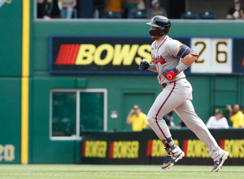 May 26, 2024; Pittsburgh, Pennsylvania, USA;  Atlanta Braves right fielder Adam Duvall (14) circles the bases on a solo home run against the Pittsburgh Pirates during the eighth inning at PNC Park. Atlanta won 8-1. Mandatory Credit: Charles LeClaire-USA TODAY Sports