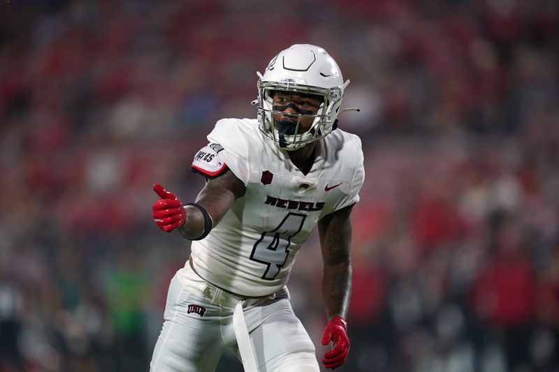 Sep 24, 2021; Fresno, California, USA; UNLV Rebels wide receiver Steve Jenkins (4) lines up before a snap against the Fresno State Bulldogs in the first quarter at Bulldog Stadium. Mandatory Credit: Cary Edmondson-USA TODAY Sports