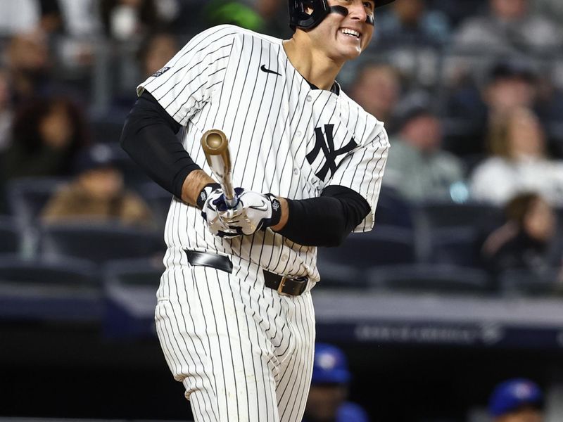 Apr 6, 2024; Bronx, New York, USA;  New York Yankees first baseman Anthony Rizzo (48) hits a two run home run in the fifth inning against the Toronto Blue Jays at Yankee Stadium. Mandatory Credit: Wendell Cruz-USA TODAY Sports