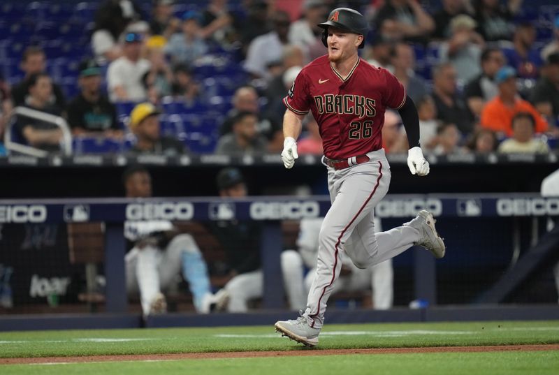 Apr 16, 2023; Miami, Florida, USA; Arizona Diamondbacks right fielder Pavin Smith (26) rounds third base and scores a run against the Miami Marlins in the sixth inning at loanDepot Park. Mandatory Credit: Jim Rassol-USA TODAY Sports