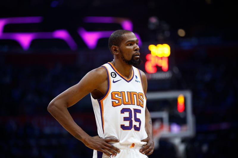 LOS ANGELES, CALIFORNIA - APRIL 20:   Kevin Durant #35 of the Phoenix Suns in the second half of Game Three of the Western Conference First Round Playoffs at Crypto.com Arena on April 20, 2023 in Los Angeles, California.  NOTE TO USER: User expressly acknowledges and agrees that, by downloading and/or using this photograph, user is consenting to the terms and conditions of the Getty Images License Agreement.  (Photo by Ronald Martinez/Getty Images)