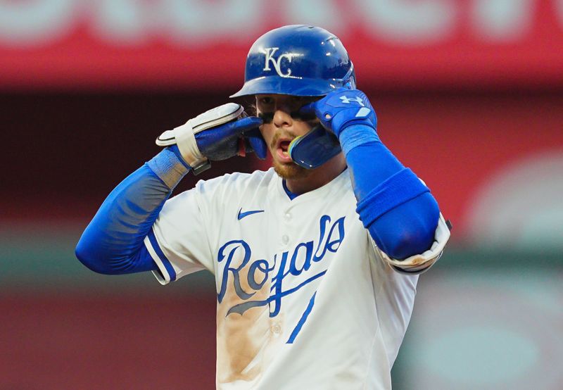 Jul 22, 2024; Kansas City, Missouri, USA; Kansas City Royals shortstop Bobby Witt Jr. (7) gestures to the dugout after hitting a double during the third inning against the Arizona Diamondbacks at Kauffman Stadium. Mandatory Credit: Jay Biggerstaff-USA TODAY Sports