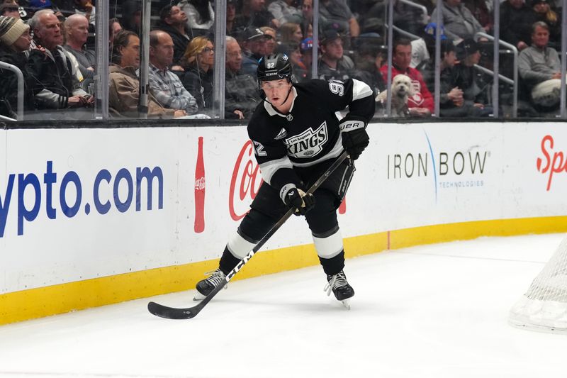Mar 5, 2026; Los Angeles, California, USA; LA Kings defenseman Brandt Clarke (92) skates against the New York Islanders in the first period at Crypto.com Arena. Mandatory Credit: Kirby Lee-Imagn Images