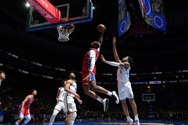 PHILADELPHIA, PA - NOVEMBER 22: Andre Drummond #5 of the Philadelphia 76ers drives to the basket during the game against the Brooklyn Nets during the Emirates NBA Cup game on November 22, 2024 at the Wells Fargo Center in Philadelphia, Pennsylvania NOTE TO USER: User expressly acknowledges and agrees that, by downloading and/or using this Photograph, user is consenting to the terms and conditions of the Getty Images License Agreement. Mandatory Copyright Notice: Copyright 2024 NBAE (Photo by Jesse D. Garrabrant/NBAE via Getty Images)