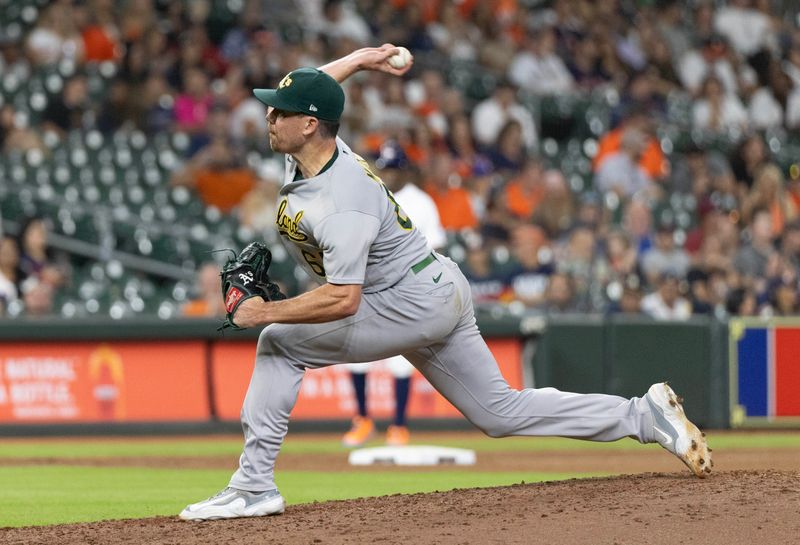 Sep 12, 2023; Houston, Texas, USA; Oakland Athletics relief pitcher Trevor May (65) pitches against the Houston Astros inn the ninth inning at Minute Maid Park. Mandatory Credit: Thomas Shea-USA TODAY Sports