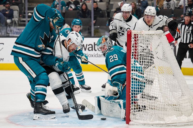 Apr 4, 2024; San Jose, California, USA; Los Angeles Kings left wing Viktor Arvidsson (33) shoots the puck against San Jose Sharks goaltender Mackenzie Blackwood (29) during the third period at SAP Center at San Jose. Mandatory Credit: Robert Edwards-USA TODAY Sports