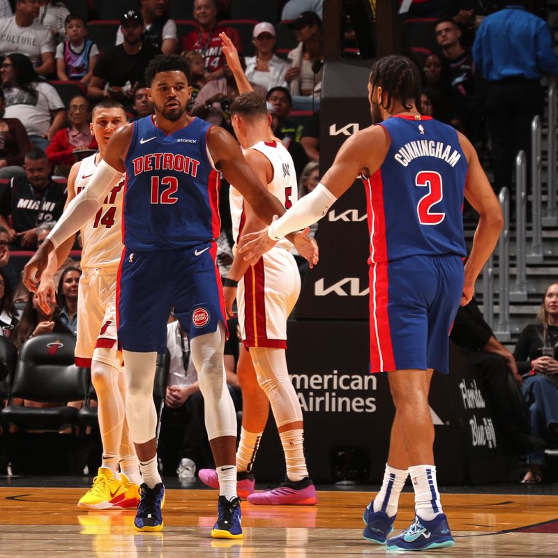 MIAMI, FL - OCTOBER 28: Tobias Harris #12 and Cade Cunningham #2 of the Detroit Pistons high five during the game against the Miami Heat on October 28, 2024 at Kaseya Center in Miami, Florida. NOTE TO USER: User expressly acknowledges and agrees that, by downloading and or using this Photograph, user is consenting to the terms and conditions of the Getty Images License Agreement. Mandatory Copyright Notice: Copyright 2024 NBAE (Photo by Issac Baldizon/NBAE via Getty Images)