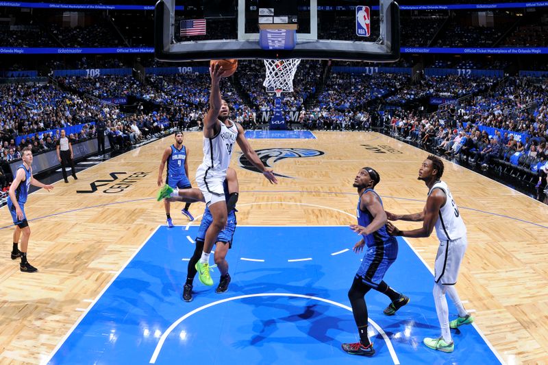 ORLANDO, FL - OCTOBER 25: Cam Thomas #24 of the Brooklyn Nets drives to the basket during the game against the Orlando Magic on October 25, 2024 at Kia Center in Orlando, Florida. NOTE TO USER: User expressly acknowledges and agrees that, by downloading and or using this photograph, User is consenting to the terms and conditions of the Getty Images License Agreement. Mandatory Copyright Notice: Copyright 2024 NBAE (Photo by Fernando Medina/NBAE via Getty Images)