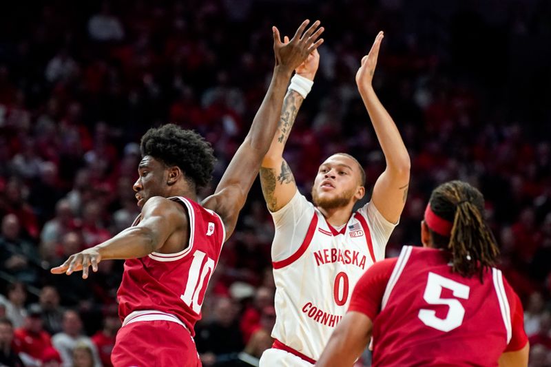 Jan 3, 2024; Lincoln, Nebraska, USA; Nebraska Cornhuskers guard C.J. Wilcher (0) shoots the ball against Indiana Hoosiers forward Kaleb Banks (10) during the first half at Pinnacle Bank Arena. Mandatory Credit: Dylan Widger-USA TODAY Sports